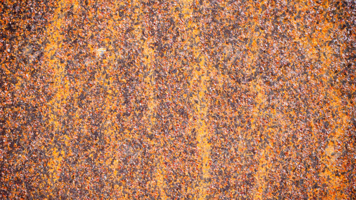 Detailaufnahme Cortenstahl Patina – Rostübergang von Orange zu Dunkelbraun als Schutzschicht gegen Korrosion.